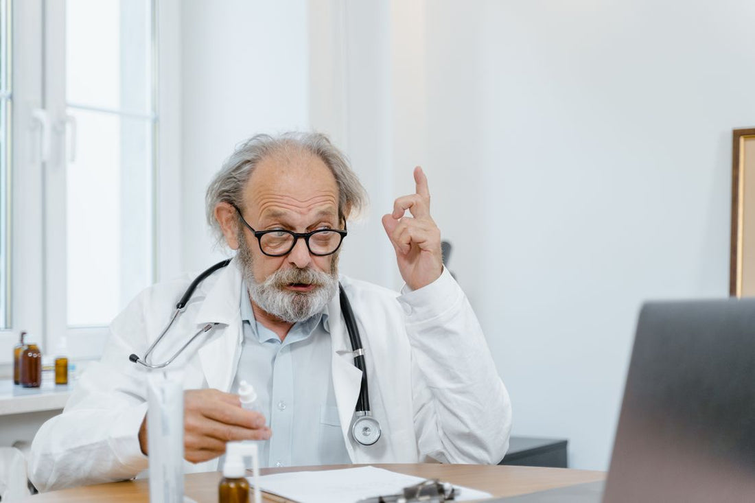 Senior doctor having an online consultation about joint health
